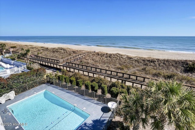 bird's eye view with a view of the beach and a water view