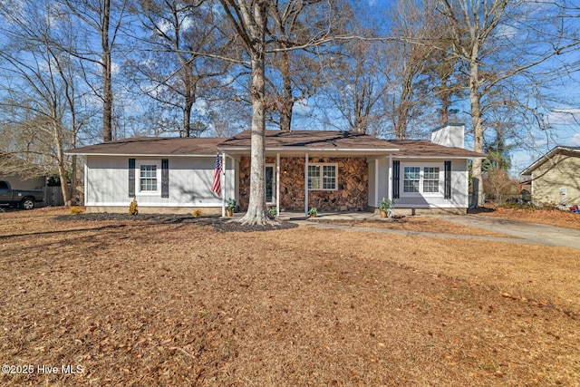 ranch-style house with a front yard