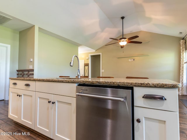 214 Admiral Ct, Sneads Ferry, NC 28460 - kitchen featuring stainless steel dishwasher, vaulted ceiling, a ceiling fan, white cabinets, and light stone countertops