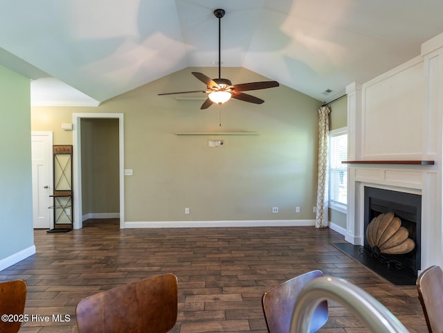 214 Admiral Ct, Sneads Ferry, NC 28460 - unfurnished living room featuring dark wood-style flooring, ceiling fan, a fireplace with flush hearth, and lofted ceiling