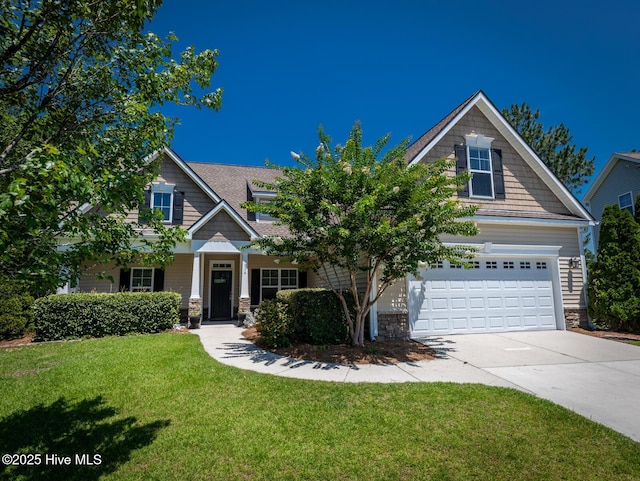 214 Admiral Ct, Sneads Ferry, NC 28460 - craftsman inspired home with stone siding, concrete driveway, a front yard, and an attached garage