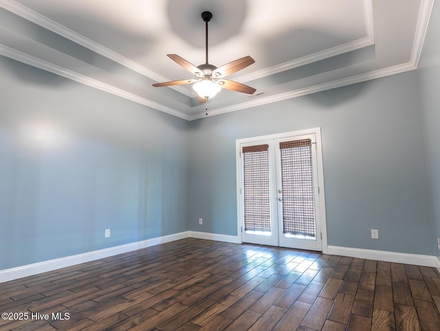 214 Admiral Ct, Sneads Ferry, NC 28460 - spare room with french doors, dark wood-type flooring, ceiling fan, a tray ceiling, and ornamental molding