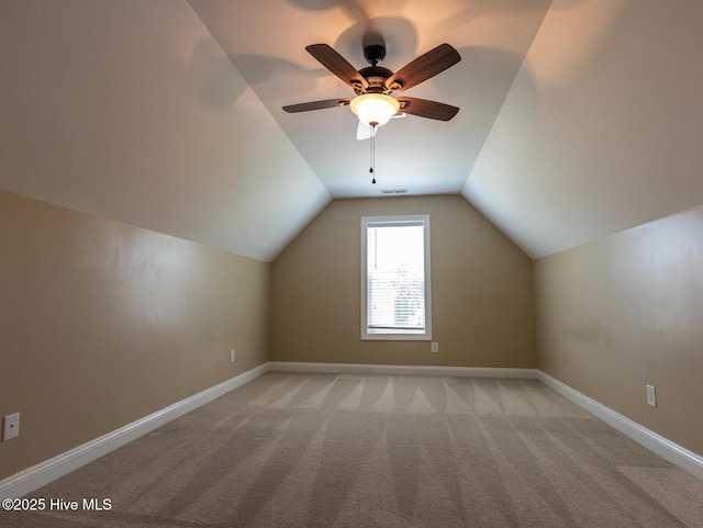 214 Admiral Ct, Sneads Ferry, NC 28460 - bonus room with vaulted ceiling, light carpet, and a ceiling fan