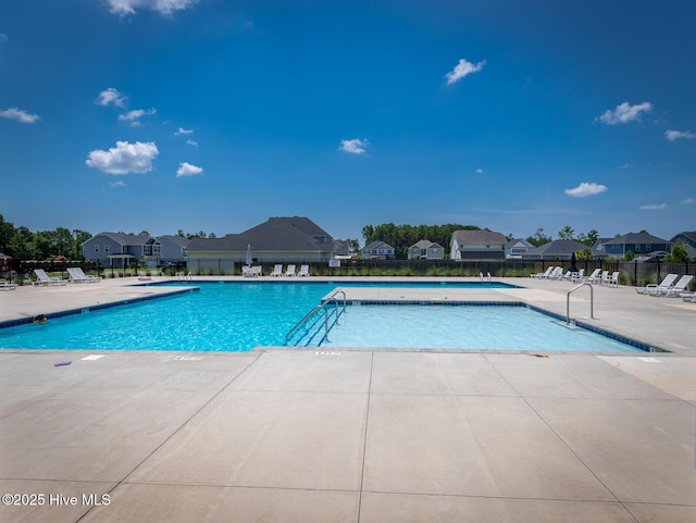214 Admiral Ct, Sneads Ferry, NC 28460 - community pool with a patio area and a residential view
