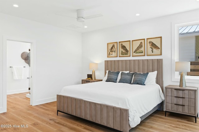 bedroom with ceiling fan and light wood-type flooring