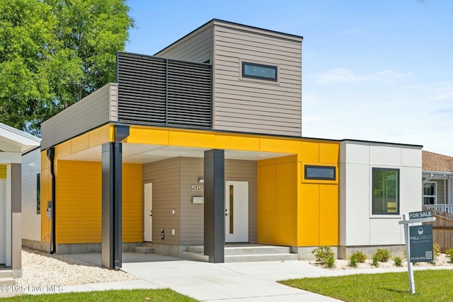 exterior space featuring a carport