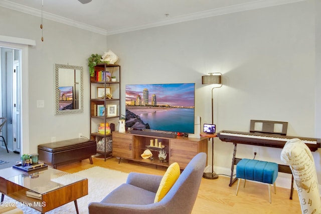 living room featuring crown molding and light hardwood / wood-style flooring