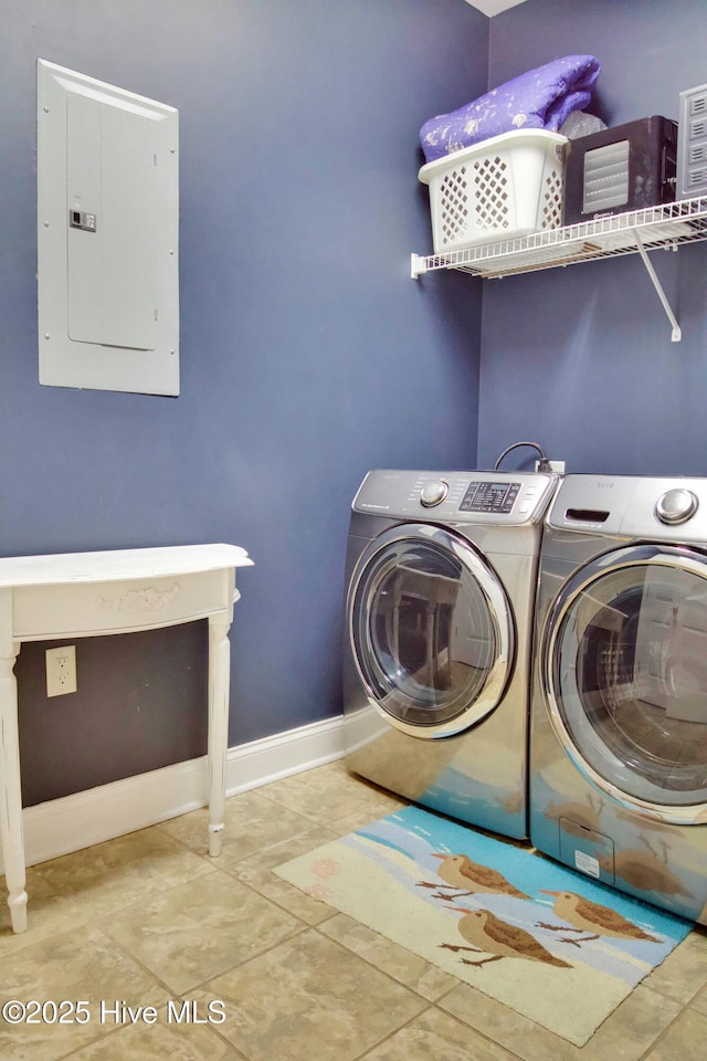 laundry area with separate washer and dryer and electric panel