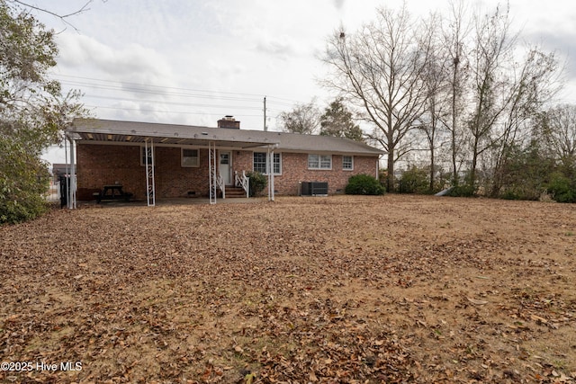 view of front of home featuring central air condition unit