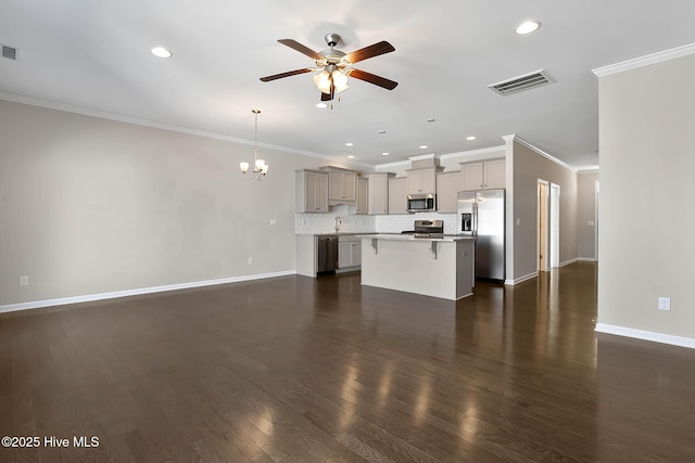 unfurnished living room featuring ornamental molding, sink, ceiling fan with notable chandelier, and dark hardwood / wood-style flooring