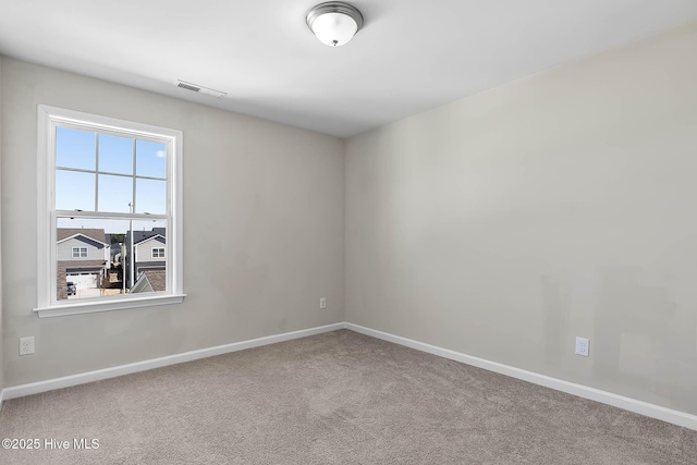 view of carpeted spare room