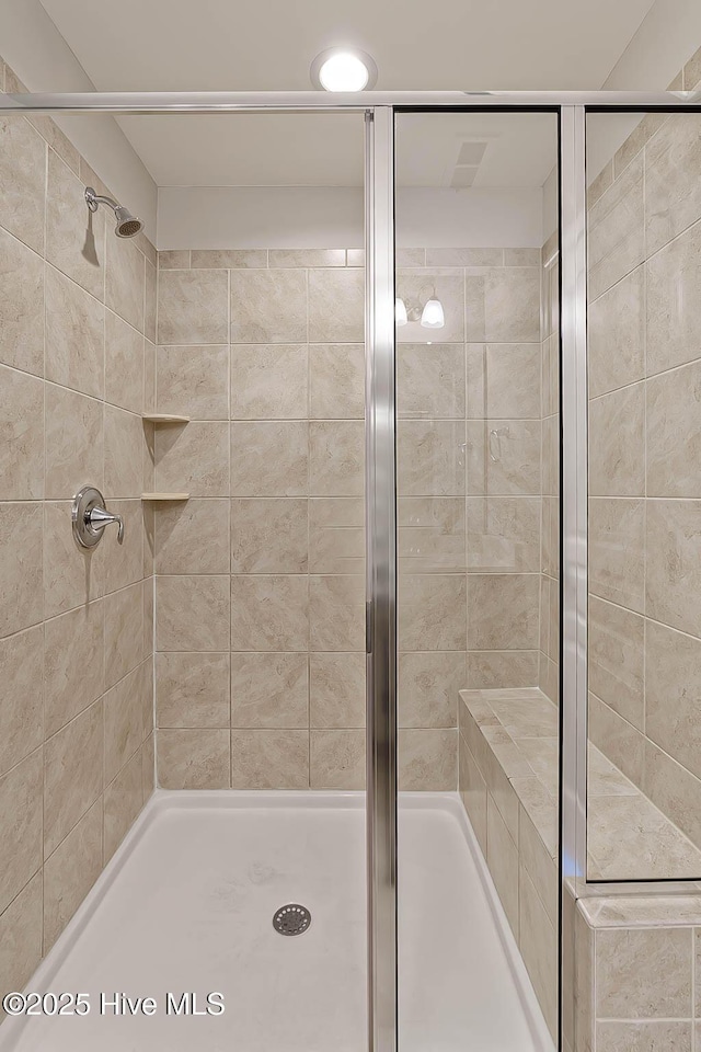 bathroom featuring walk in shower