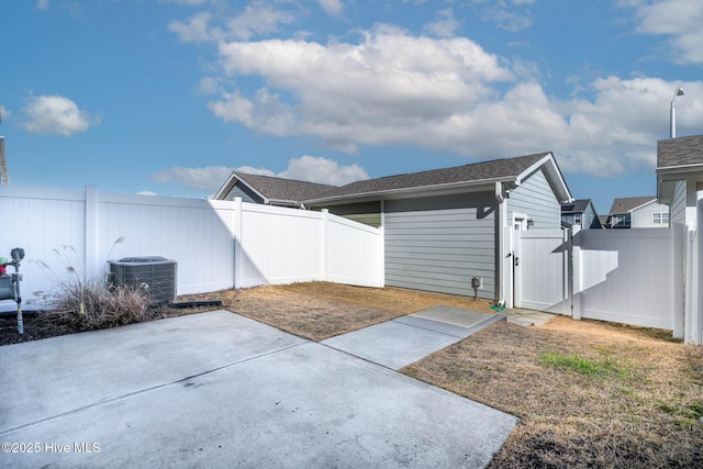 exterior space featuring a patio and cooling unit