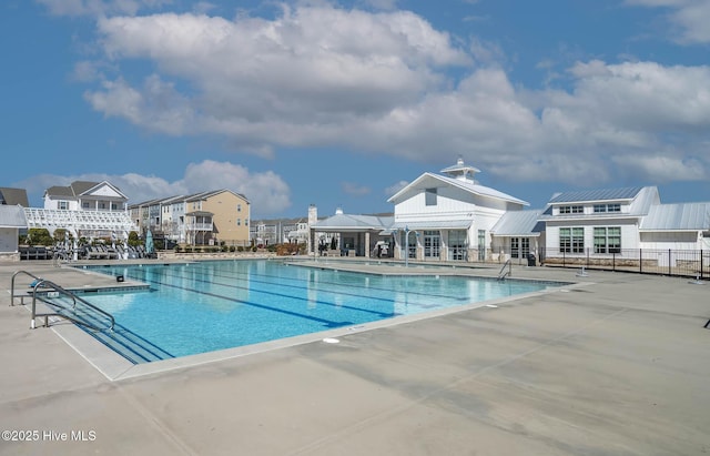 view of swimming pool featuring a patio