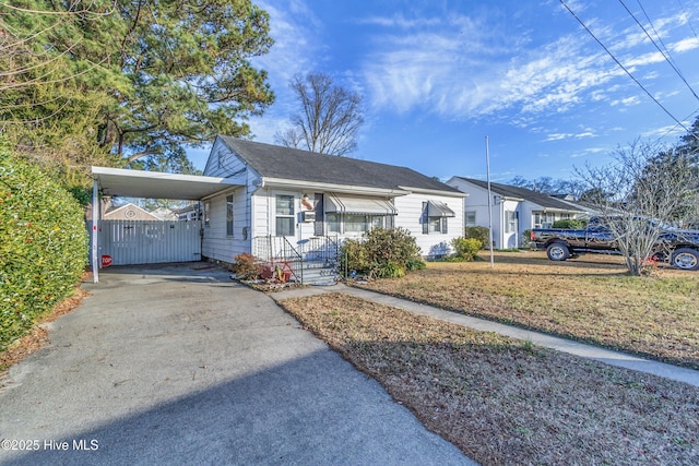 view of front of home featuring a carport