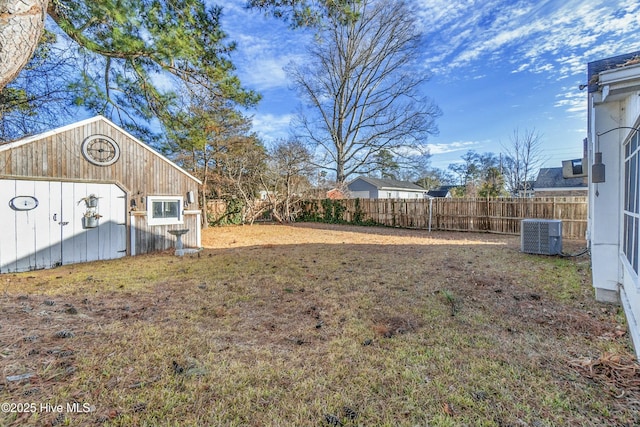 view of yard featuring central AC unit