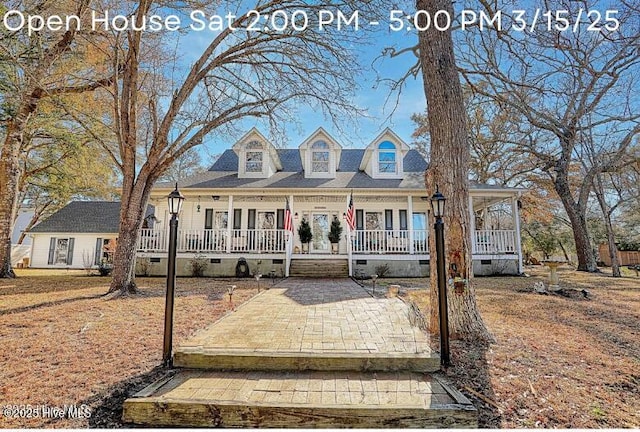 view of front of home featuring covered porch and crawl space