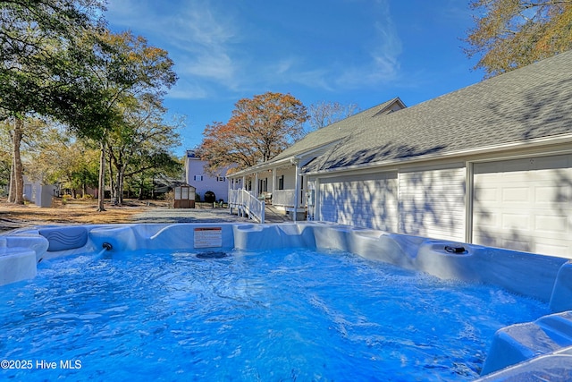 view of pool with a pool