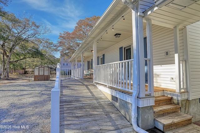 exterior space featuring an outbuilding and a storage shed