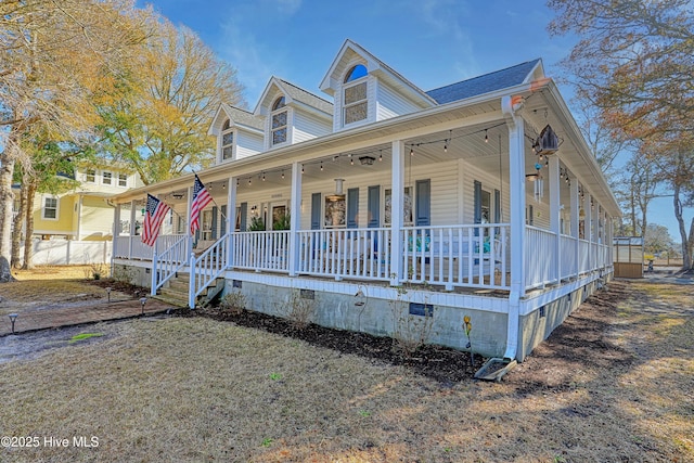 view of front facade with crawl space and a porch