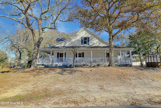 country-style home featuring crawl space and covered porch