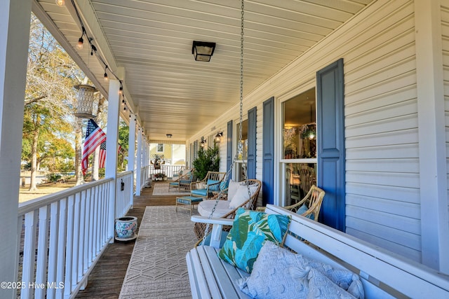 wooden deck with a porch