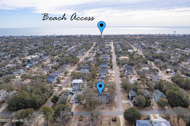 birds eye view of property featuring a residential view and a water view