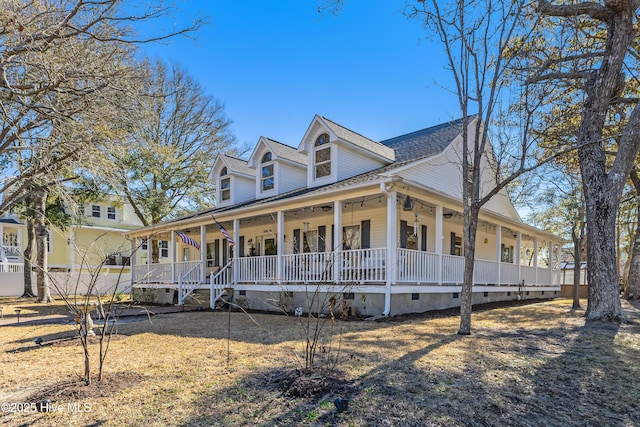 country-style home featuring crawl space, covered porch, and roof with shingles