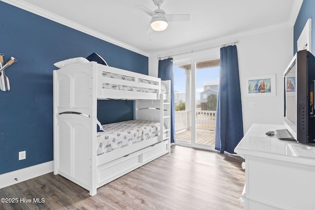 bedroom featuring access to exterior, ornamental molding, hardwood / wood-style floors, and ceiling fan