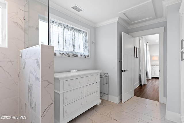 bathroom with crown molding and a shower