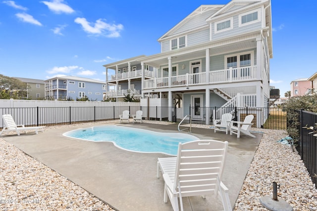 view of pool featuring a patio area