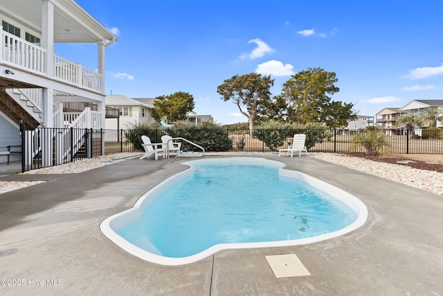 view of swimming pool featuring a patio