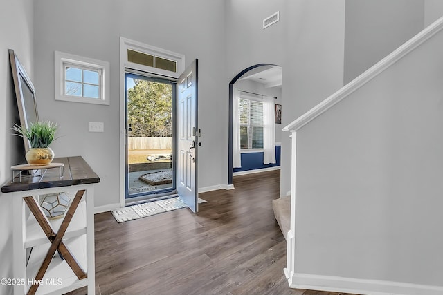 foyer entrance with hardwood / wood-style flooring