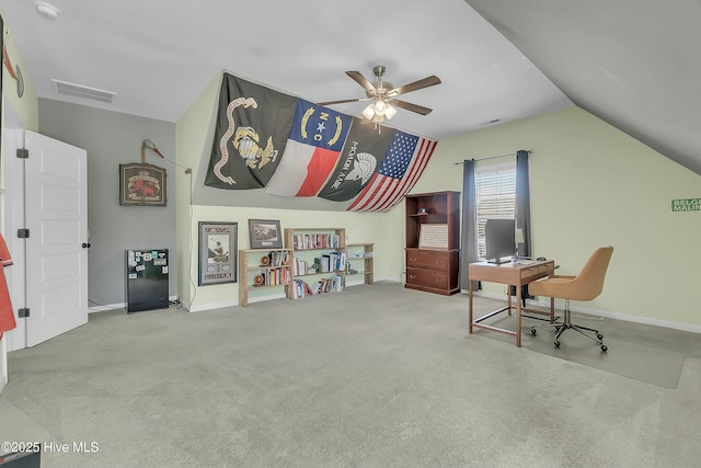 carpeted office with ceiling fan and lofted ceiling