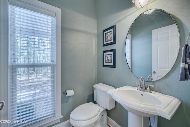 bathroom featuring sink and toilet