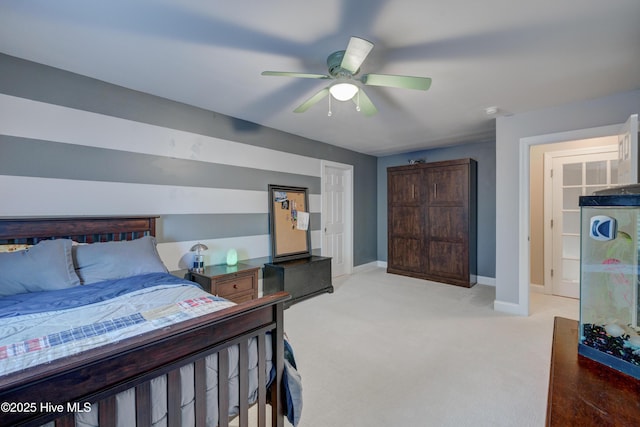 bedroom with ceiling fan and light colored carpet