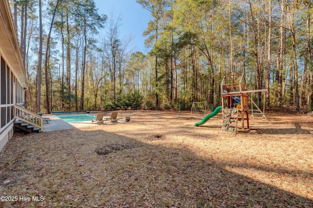 view of yard with a playground