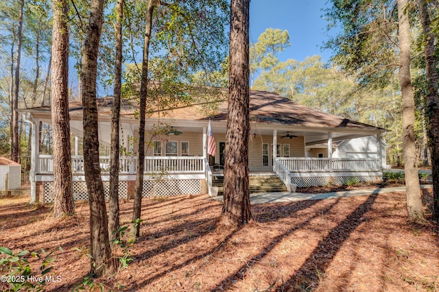 view of front of home with ceiling fan and covered porch