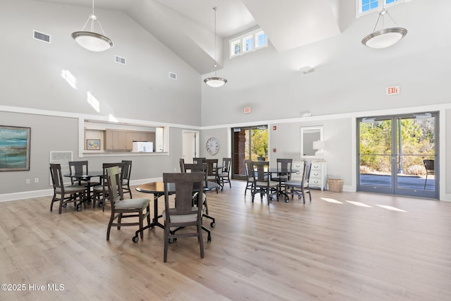 dining area with light wood-type flooring