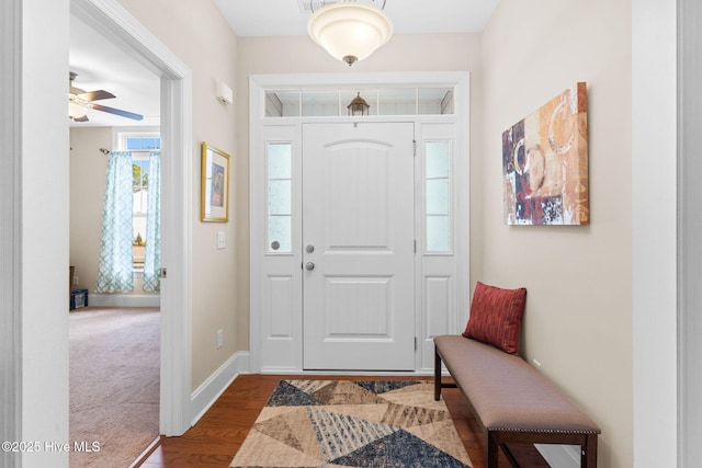 entryway with ceiling fan and hardwood / wood-style floors