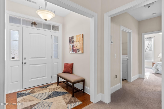 entrance foyer with washer / dryer