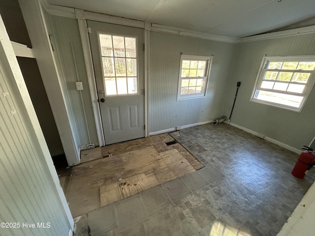 doorway featuring ornamental molding