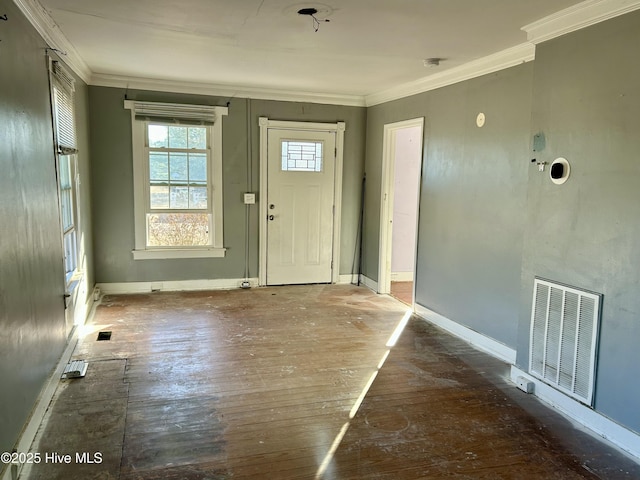 foyer featuring crown molding and dark hardwood / wood-style floors