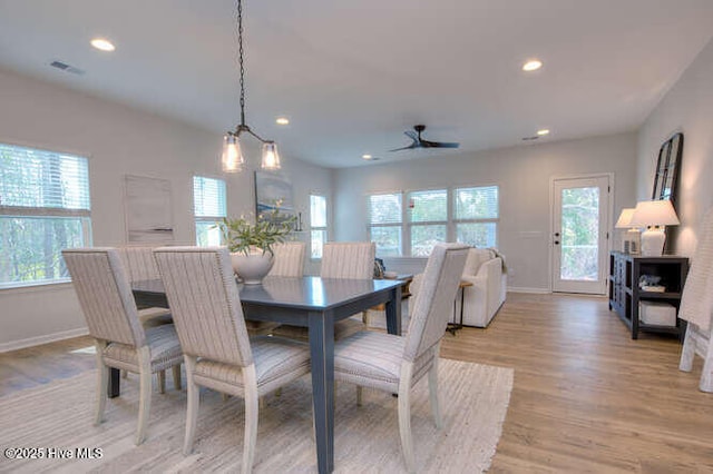 dining room featuring baseboards, visible vents, a ceiling fan, light wood-type flooring, and recessed lighting