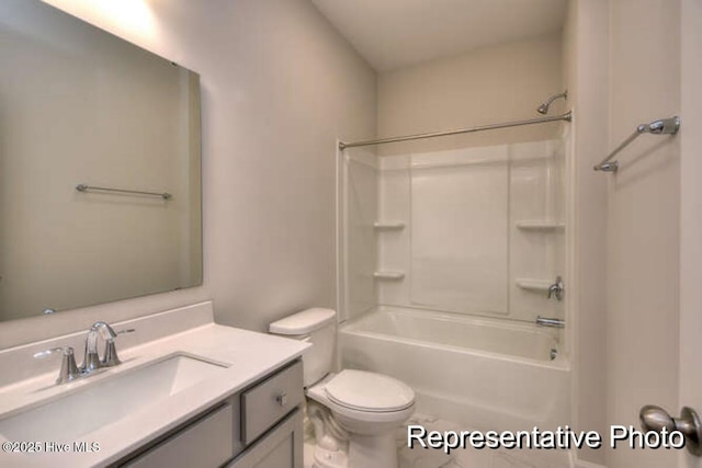 full bathroom with vanity, tub / shower combination, and toilet