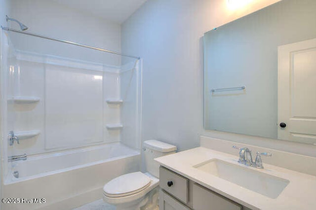 bathroom with toilet, shower / bath combination, and vanity