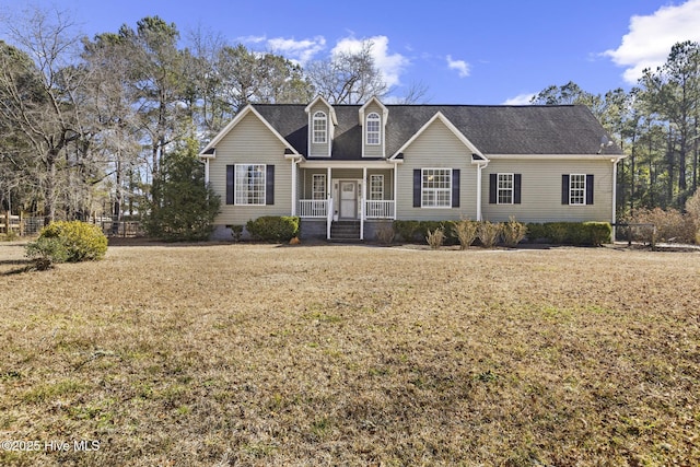 view of front facade with a porch and a front lawn