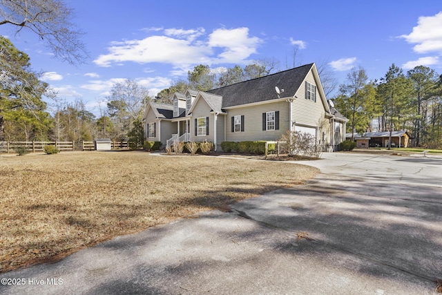 view of side of property featuring a garage