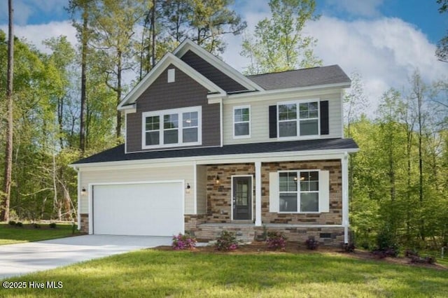 craftsman-style home with a garage and a front lawn