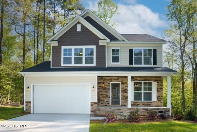 craftsman house with a garage and covered porch